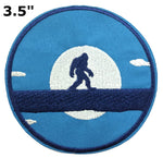 Bigfoot Walking Across Fallen Tree - Moon - 3.5" Embroidered Iron / Sew-on Patch Cryptid Creature Series