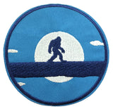 Bigfoot Walking Across Fallen Tree - Moon - 3.5" Embroidered Iron / Sew-on Patch Cryptid Creature Series